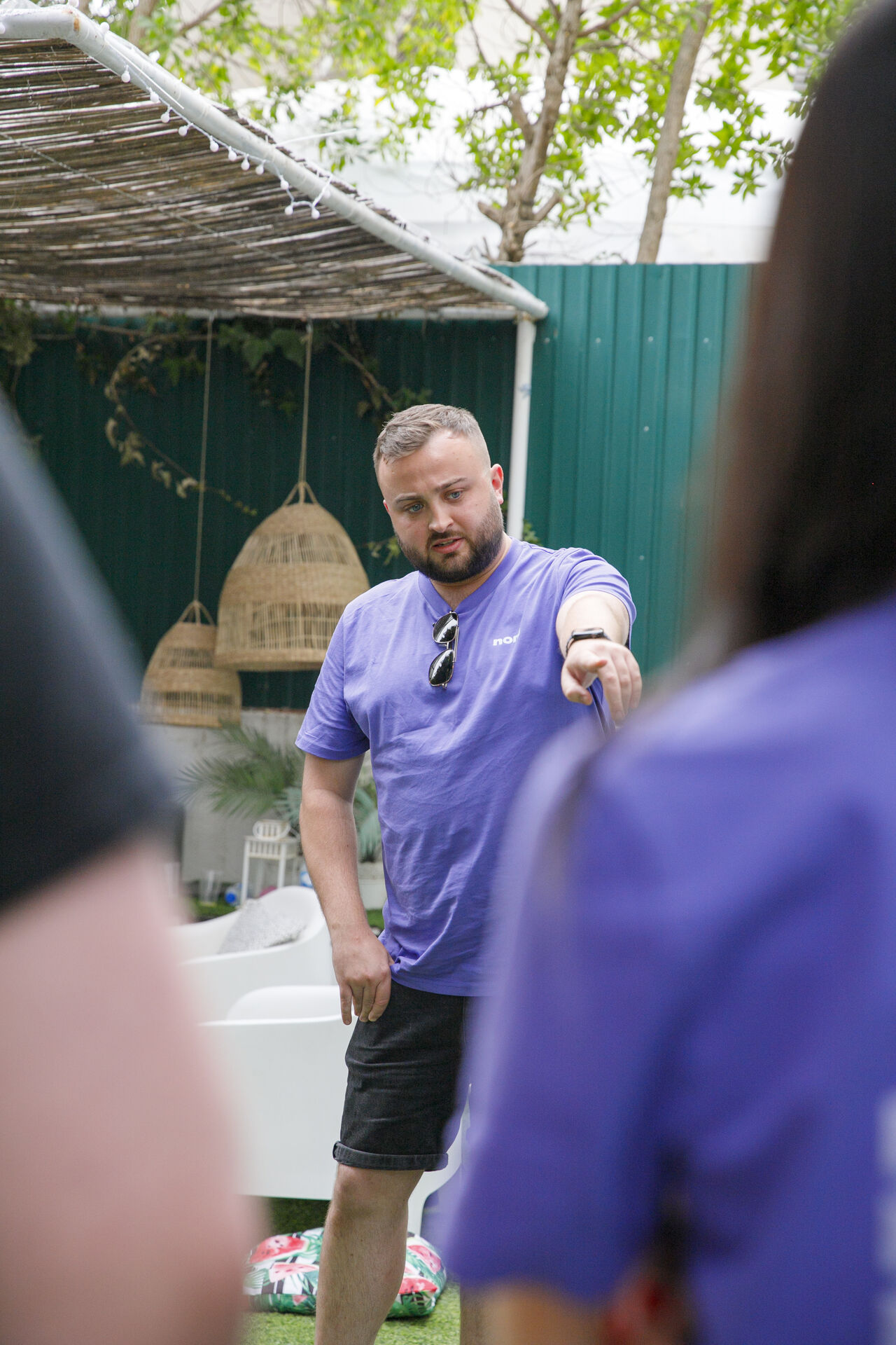 Leading a Nory team discussion outdoors
