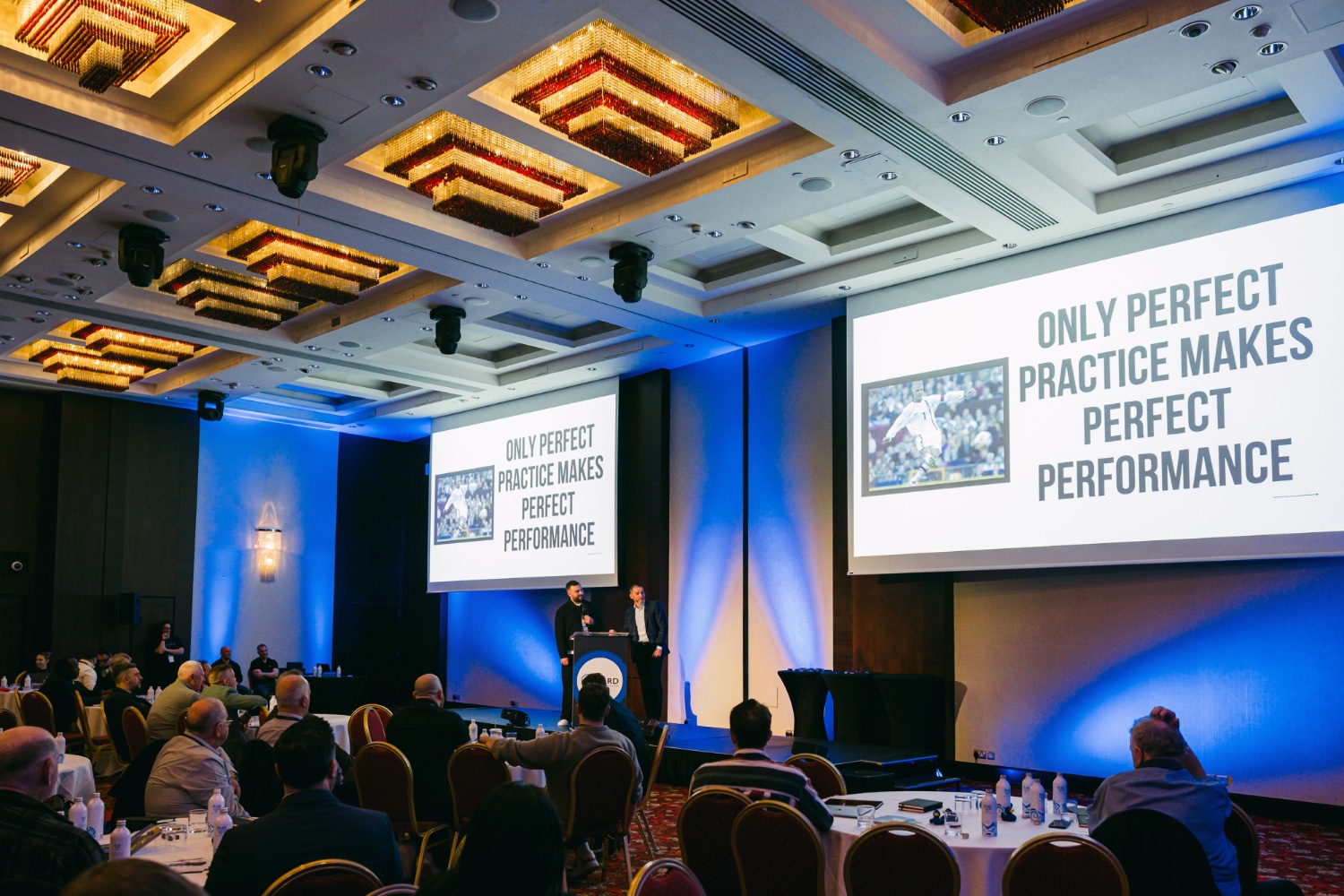 Speaking on stage at a partner event